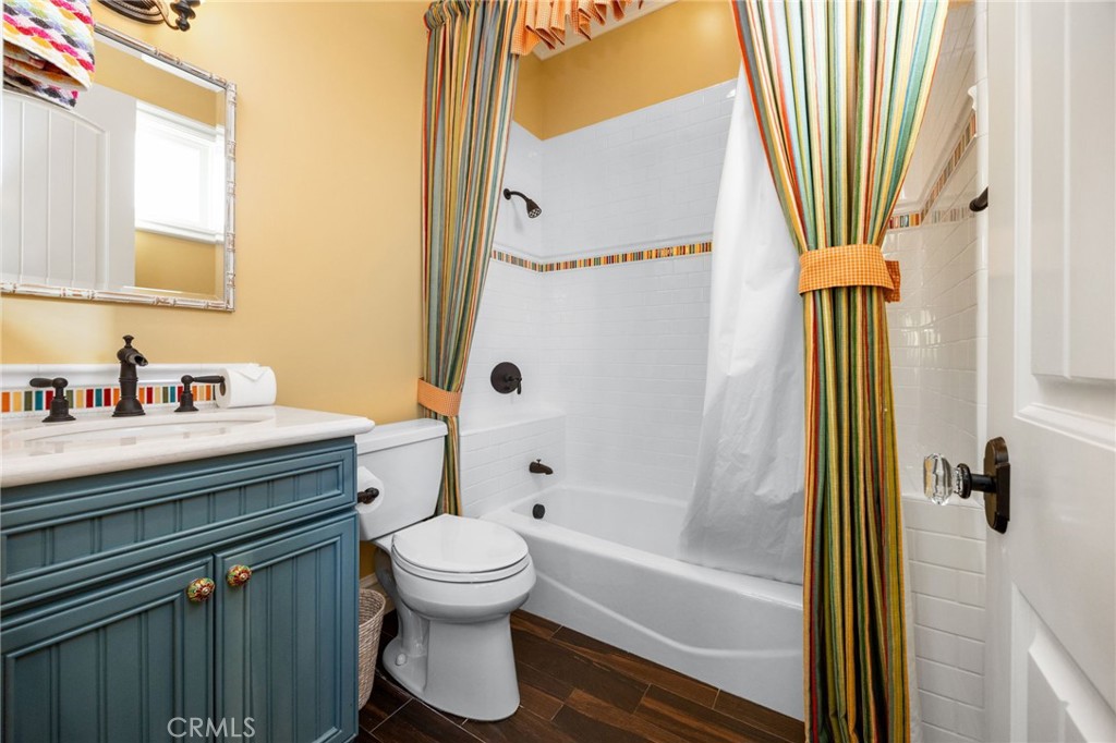 1450 North Nicky Way Orange, CA 92869 - Photo 45 of 64 a bathroom with a sink a toilet and a shower