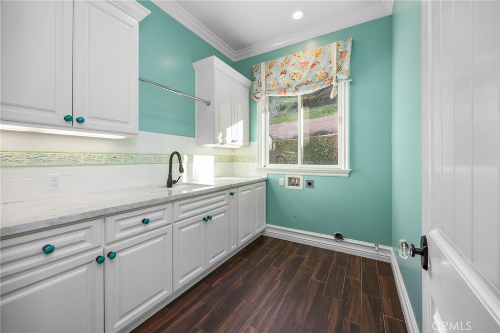 1450 North Nicky Way Orange, CA 92869 - Photo 47 of 64 a view of a kitchen with wooden floor and electronic appliances