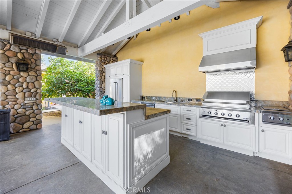 1450 North Nicky Way Orange, CA 92869 - Photo 58 of 64 a kitchen with white cabinets and white appliances