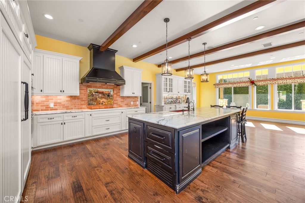 1450 North Nicky Way Orange, CA 92869 - Photo 6 of 64 a kitchen with stainless steel appliances granite countertop a stove and a sink