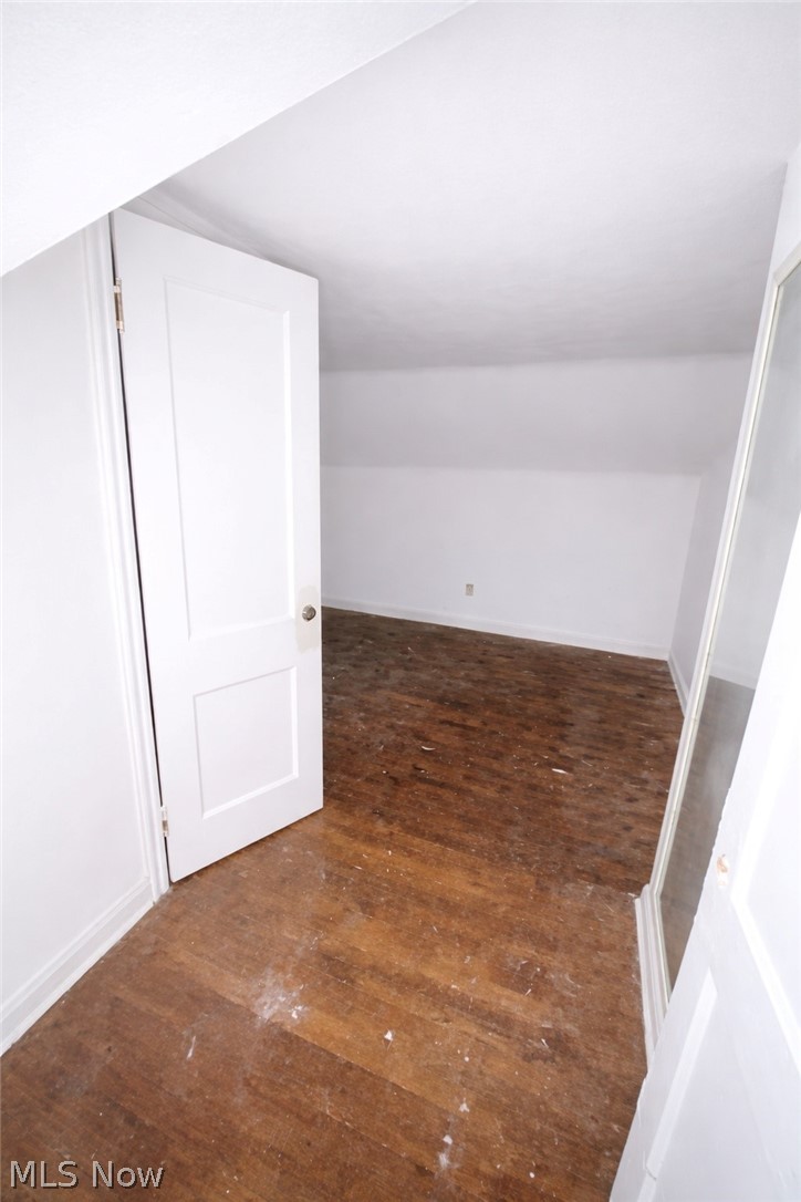 3575 Gridley Road Shaker Heights, OH 44122 - Photo 31 of 47 3rd Floor Rm with dark wood finished floors and lofted ceiling