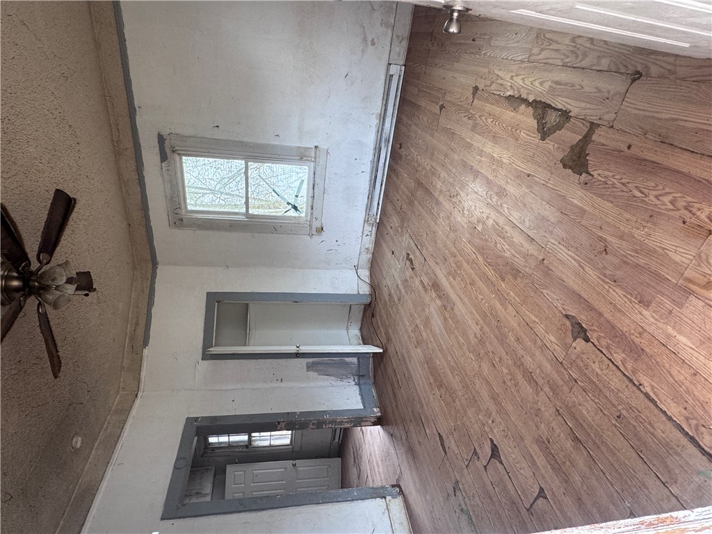 32 Ames Street Seneca, SC 29678 - Photo 2 of 14 This interior space features beautiful hardwood flooring and a window, offering natural light.