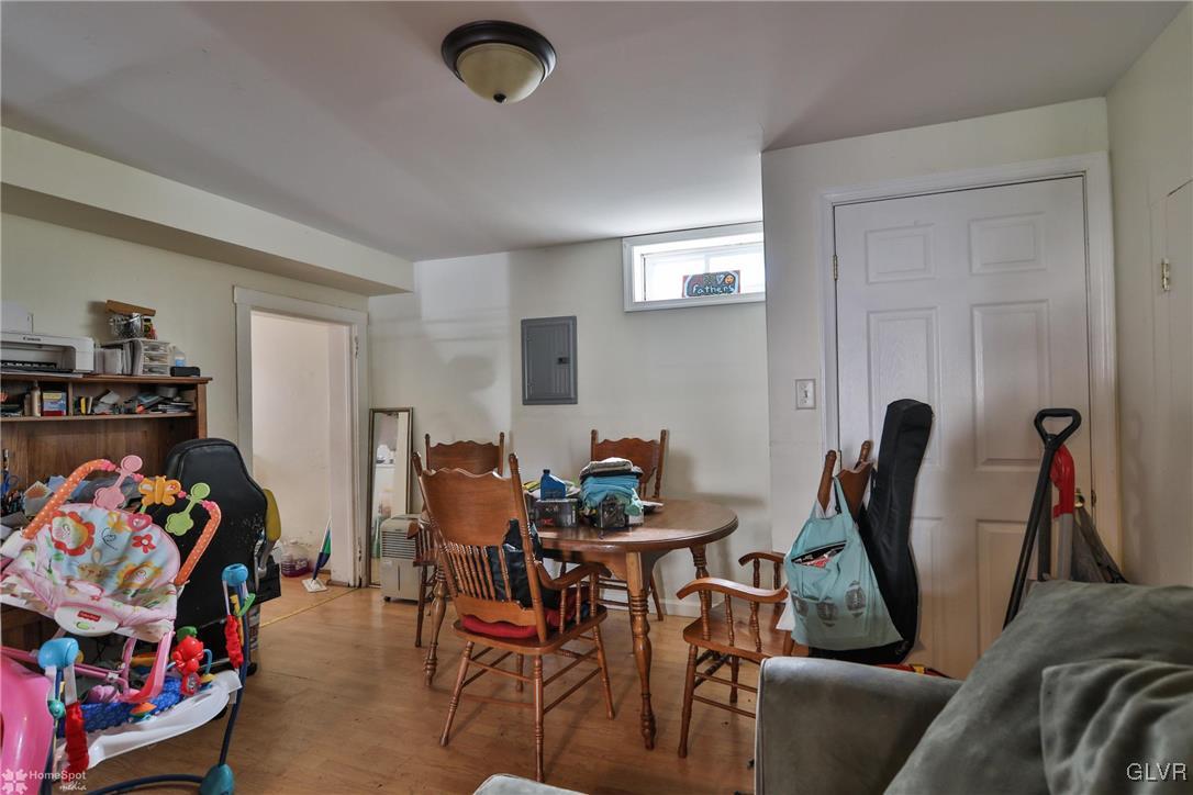 5562 Main Street Whitehall, PA 18052 - Photo 26 of 50 a view of a workspace with furniture and a couch