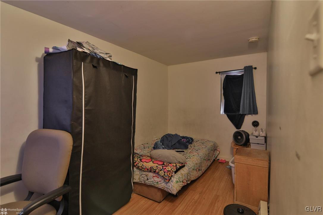 5562 Main Street Whitehall, PA 18052 - Photo 34 of 50 a bedroom with a bed and furniture