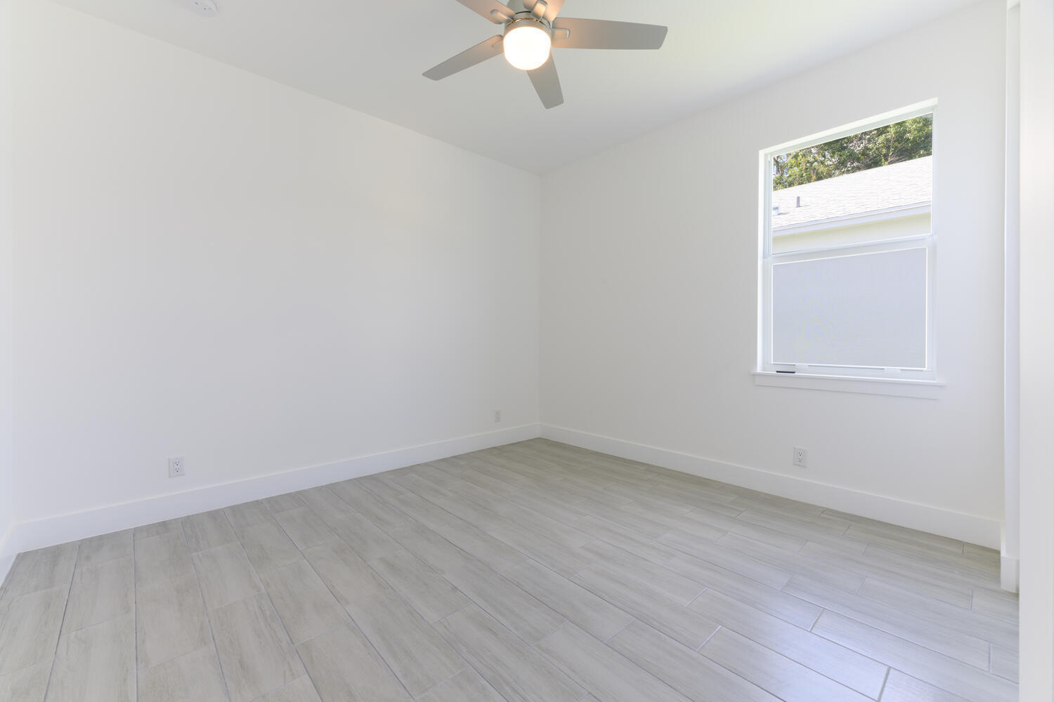 18058 Limestone Creek Road Jupiter, FL 33458 - Photo 17 of 30 an empty room with a window