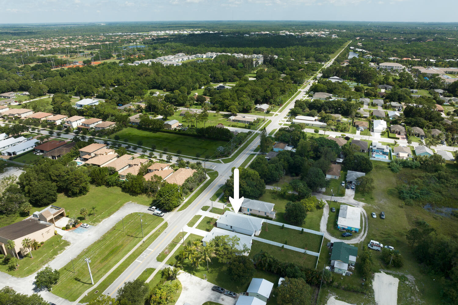 18058 Limestone Creek Road Jupiter, FL 33458 - Photo 29 of 30 an aerial view of residential houses with outdoor space and river