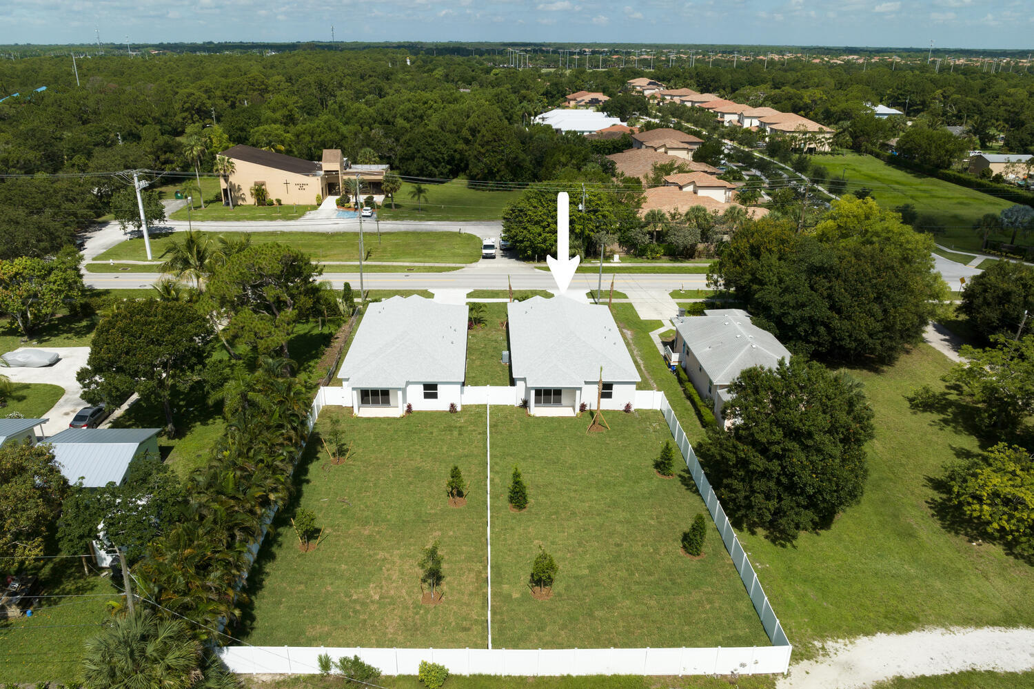 18058 Limestone Creek Road Jupiter, FL 33458 - Photo 3 of 30 an aerial view of a house with a garden