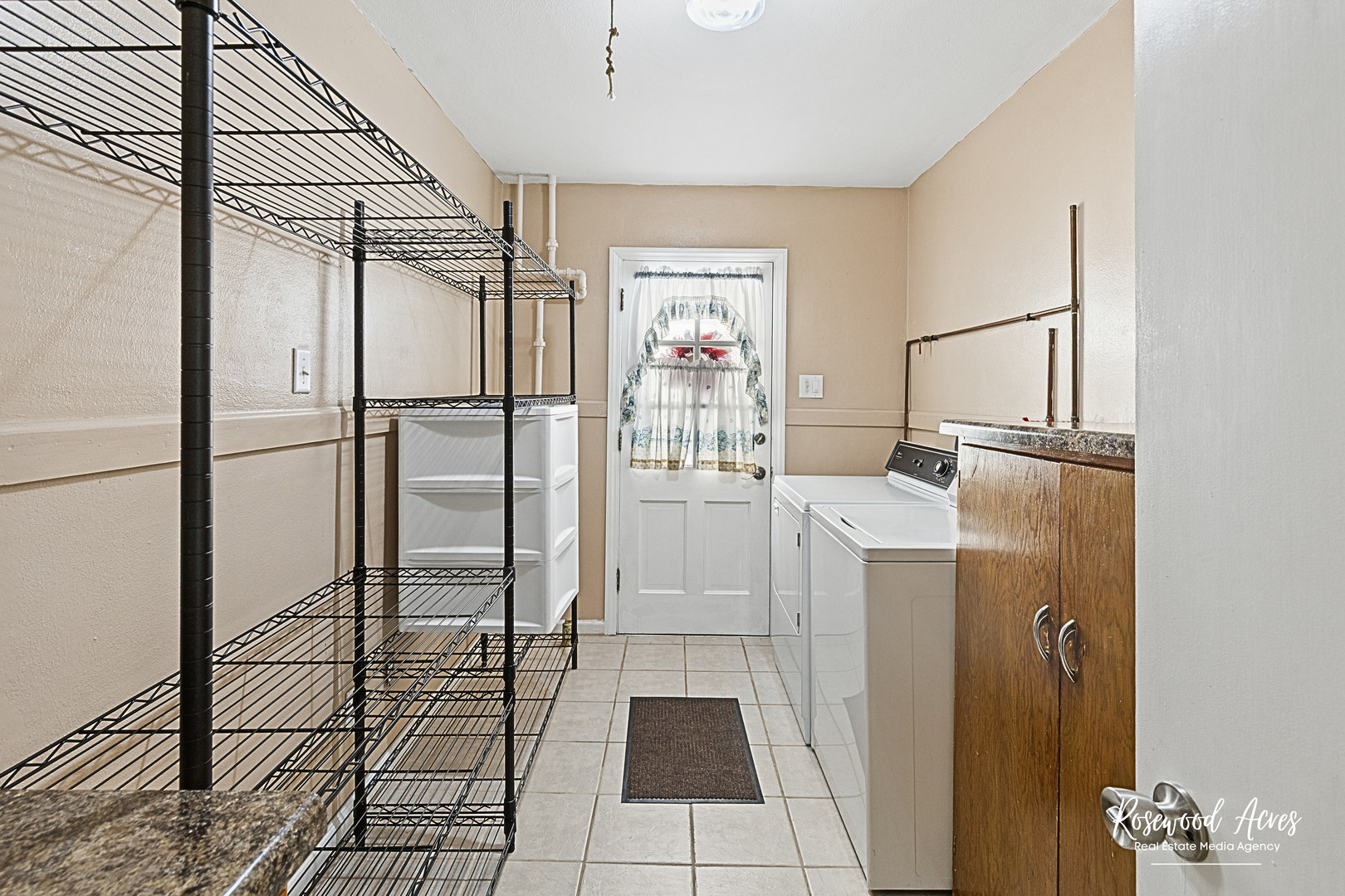 580 Enos Avenue Kankakee, IL 60901 - Photo 18 of 22 a view of a refrigerator in kitchen and an empty room