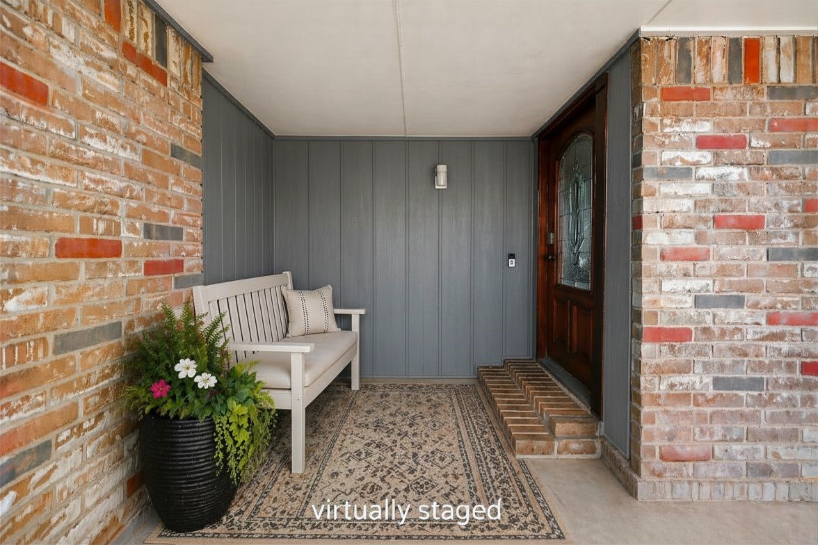 5323 Windsong Trail Houston, TX 77084 - Photo 7 of 30 Virtually staged. Welcoming covered front porch offers a cozy spot to sit and provides protection from the elements.
