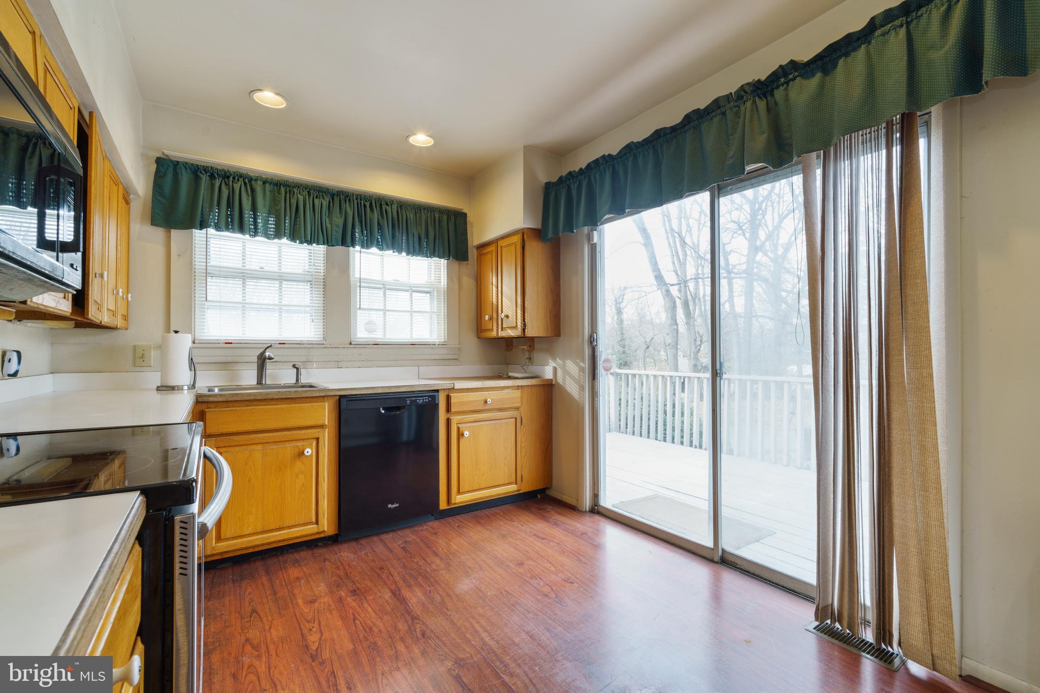 1313 Rogers Road Annapolis, MD 21409 - Photo 9 of 43 Kitchen leads to deck area for summer dining