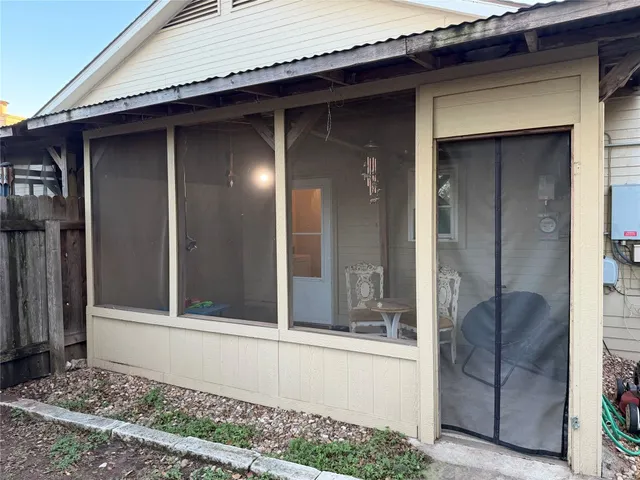 a front view of a house with a glass door