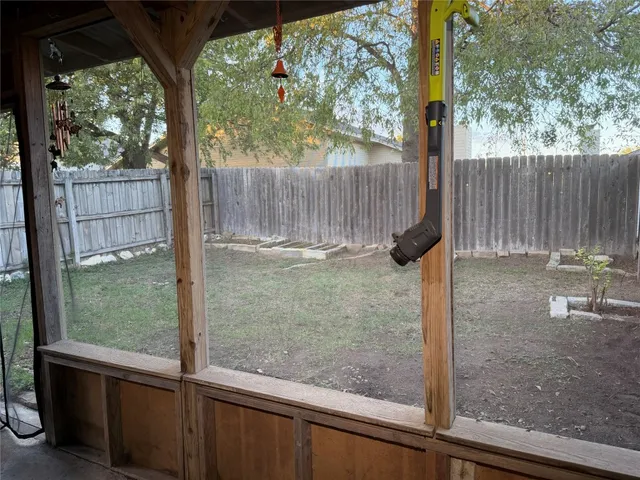 a backyard of a house with lots of green space