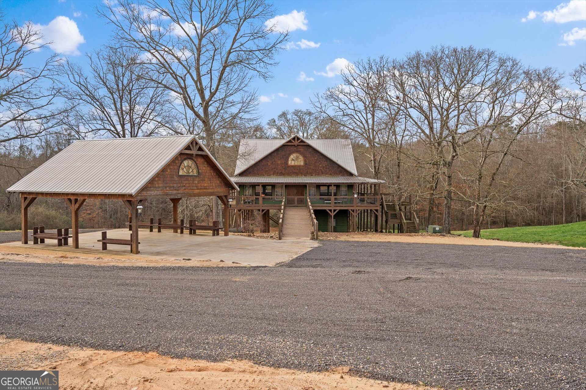 976 Salem Church Road Carrollton, GA 30117 - Photo 2 of 55 a front view of a house with a yard and garage