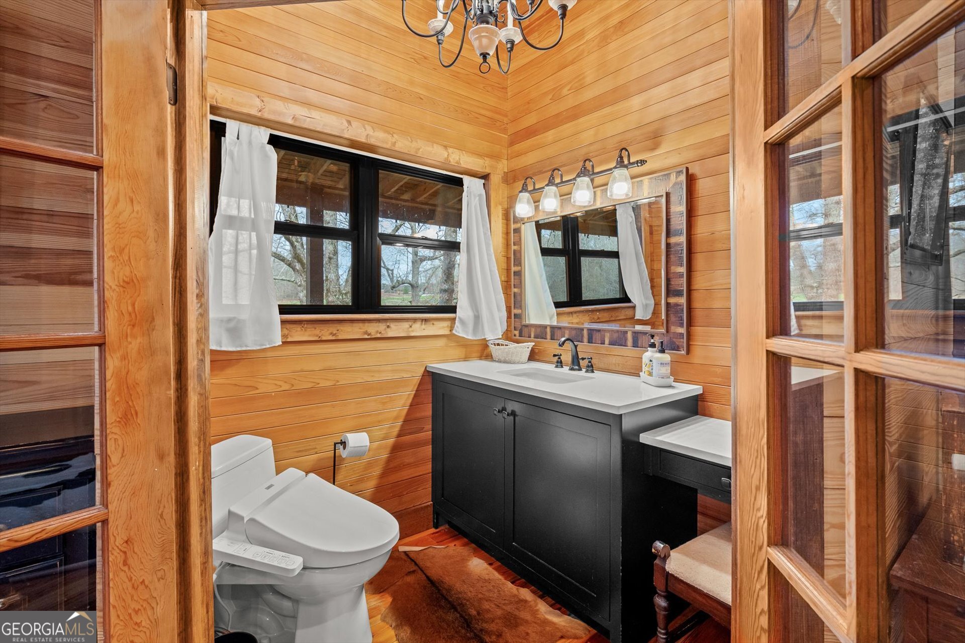 976 Salem Church Road Carrollton, GA 30117 - Photo 23 of 55 a bathroom with a sink toilet mirror and tub