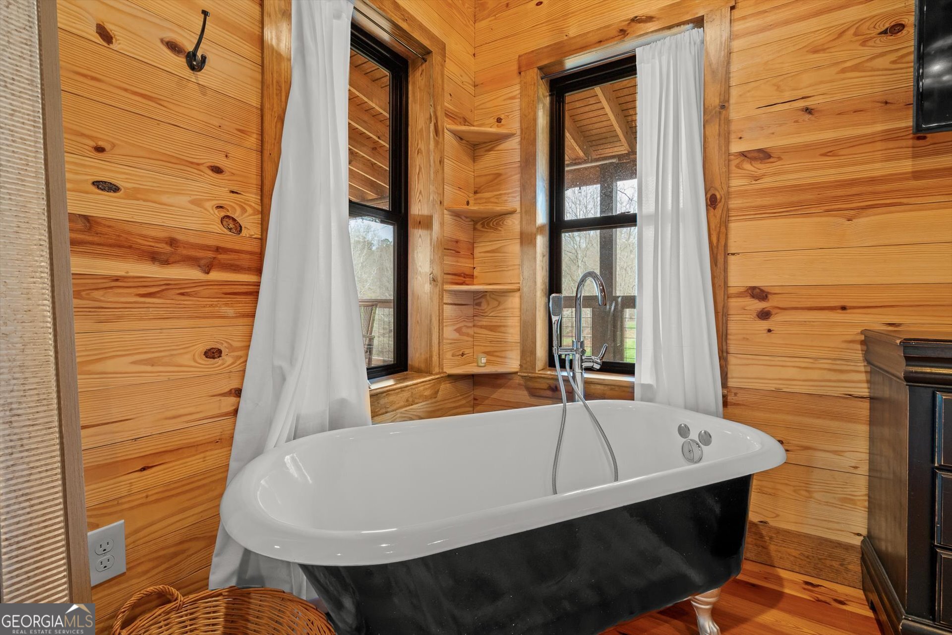 976 Salem Church Road Carrollton, GA 30117 - Photo 24 of 55 a bathroom with a bathtub and shower