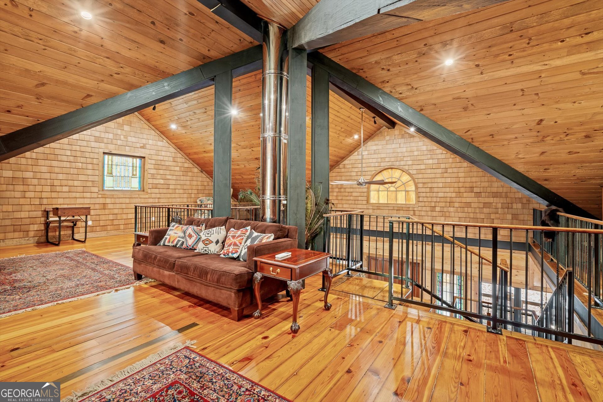 976 Salem Church Road Carrollton, GA 30117 - Photo 35 of 55 a balcony with furniture and wooden floor