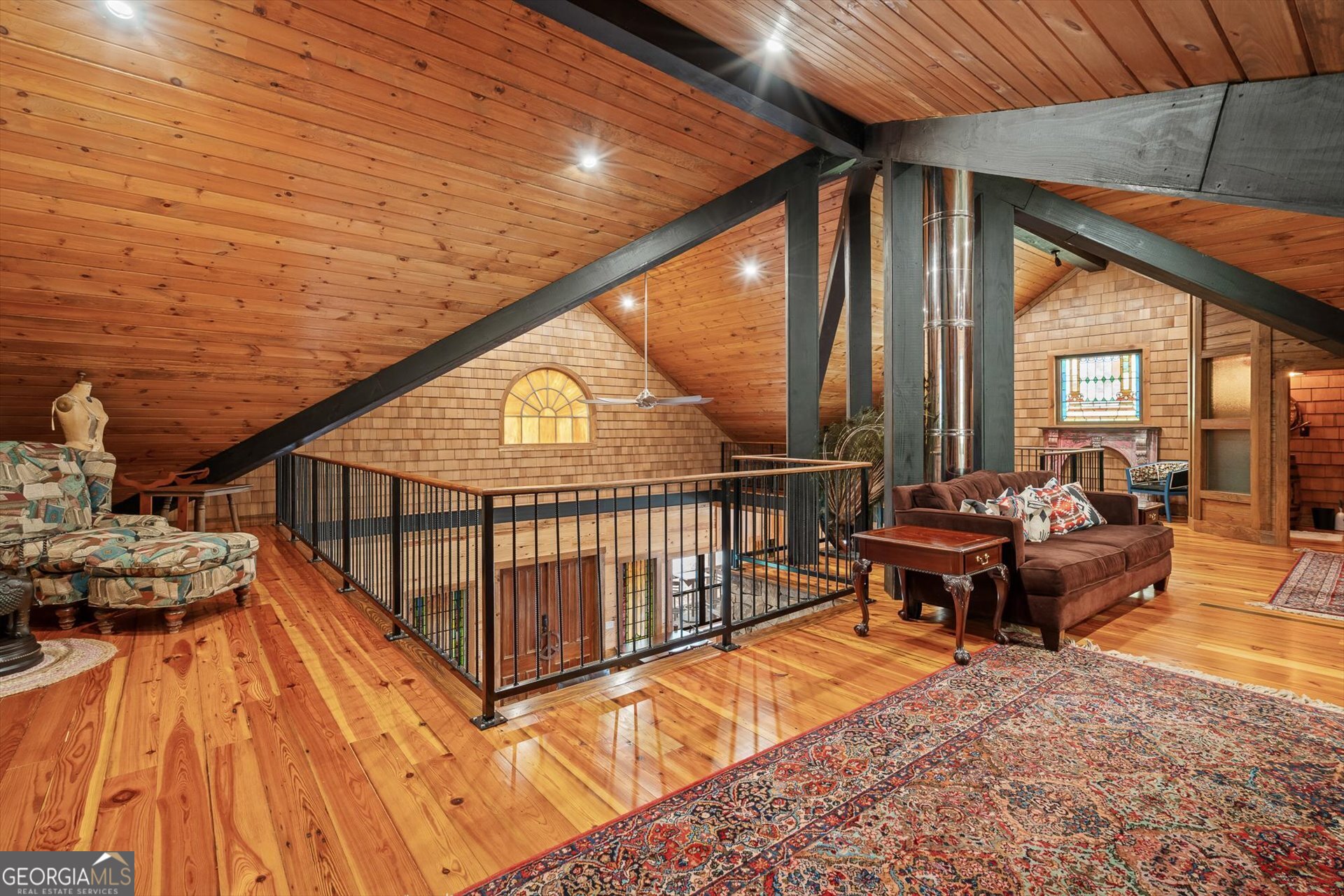 976 Salem Church Road Carrollton, GA 30117 - Photo 41 of 55 a balcony with chairs and a table