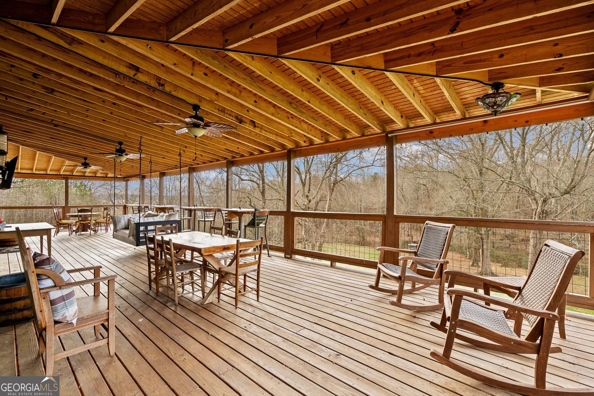 976 Salem Church Road Carrollton, GA 30117 - Photo 45 of 55 a view of a chairs and table on the deck