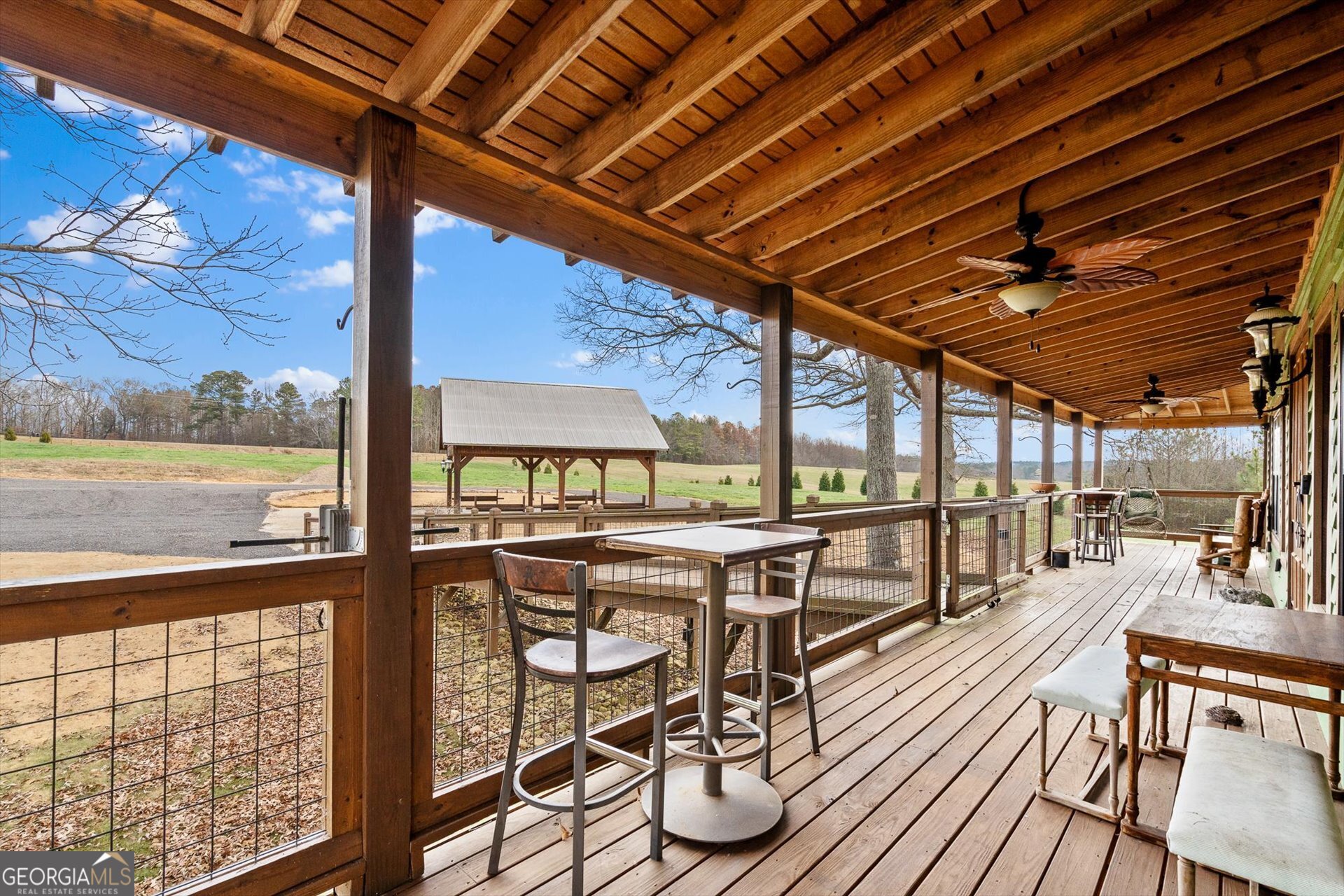976 Salem Church Road Carrollton, GA 30117 - Photo 49 of 55 a view of a patio with wooden floor