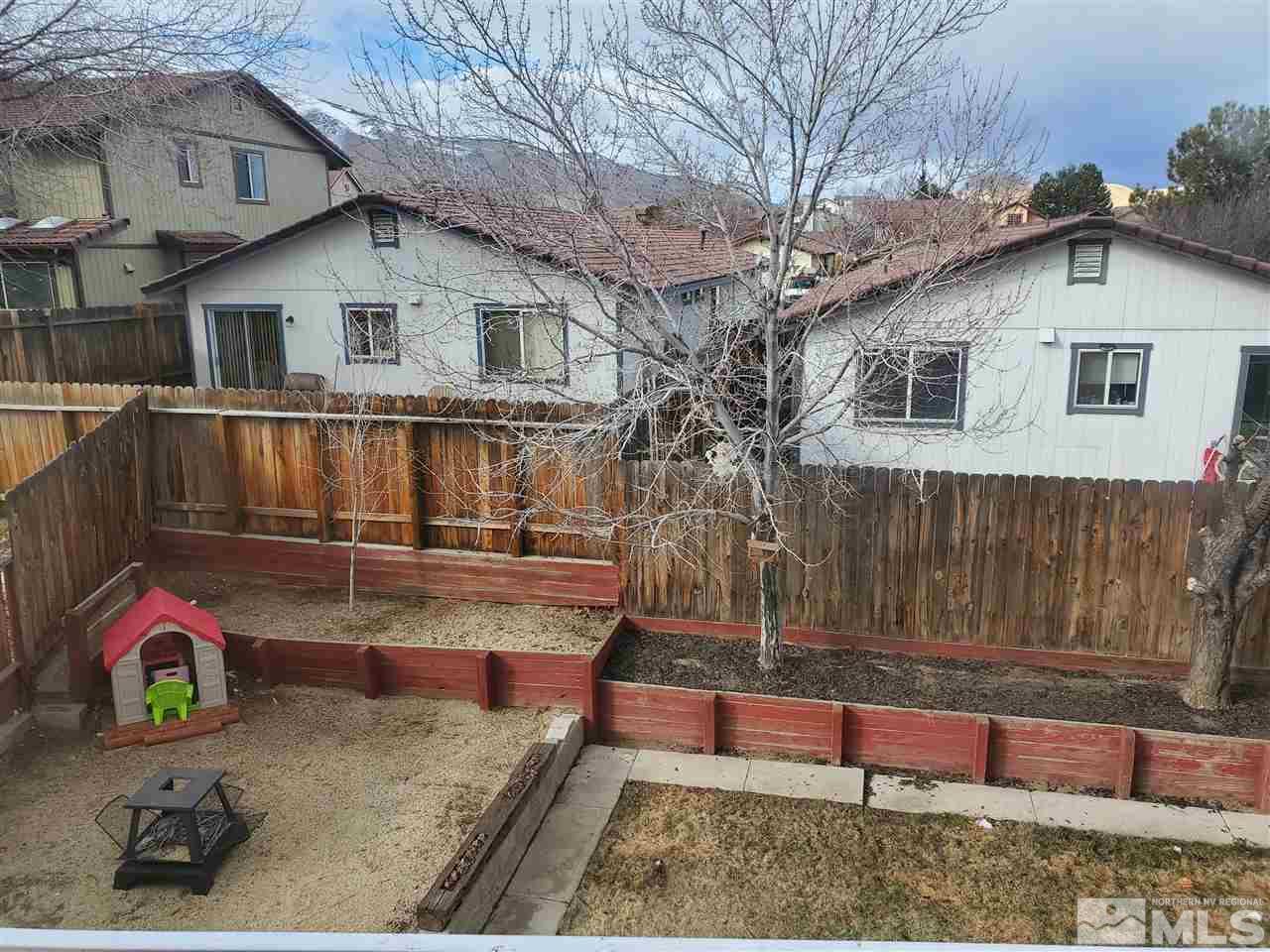 6940 Flower Street Reno, NV 89506 - Photo 14 of 20 a view of small yard in front of house