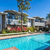 a front view of a house with swimming pool
