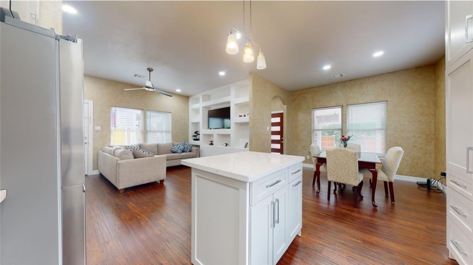 426 Middle Street Houston, TX 77003 - Photo 15 of 38 a view of living room with granite countertop furniture and a wooden floor