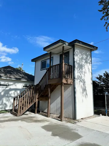 a view of a house with a balcony