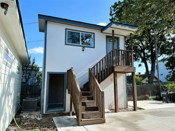 a front view of a house with a porch