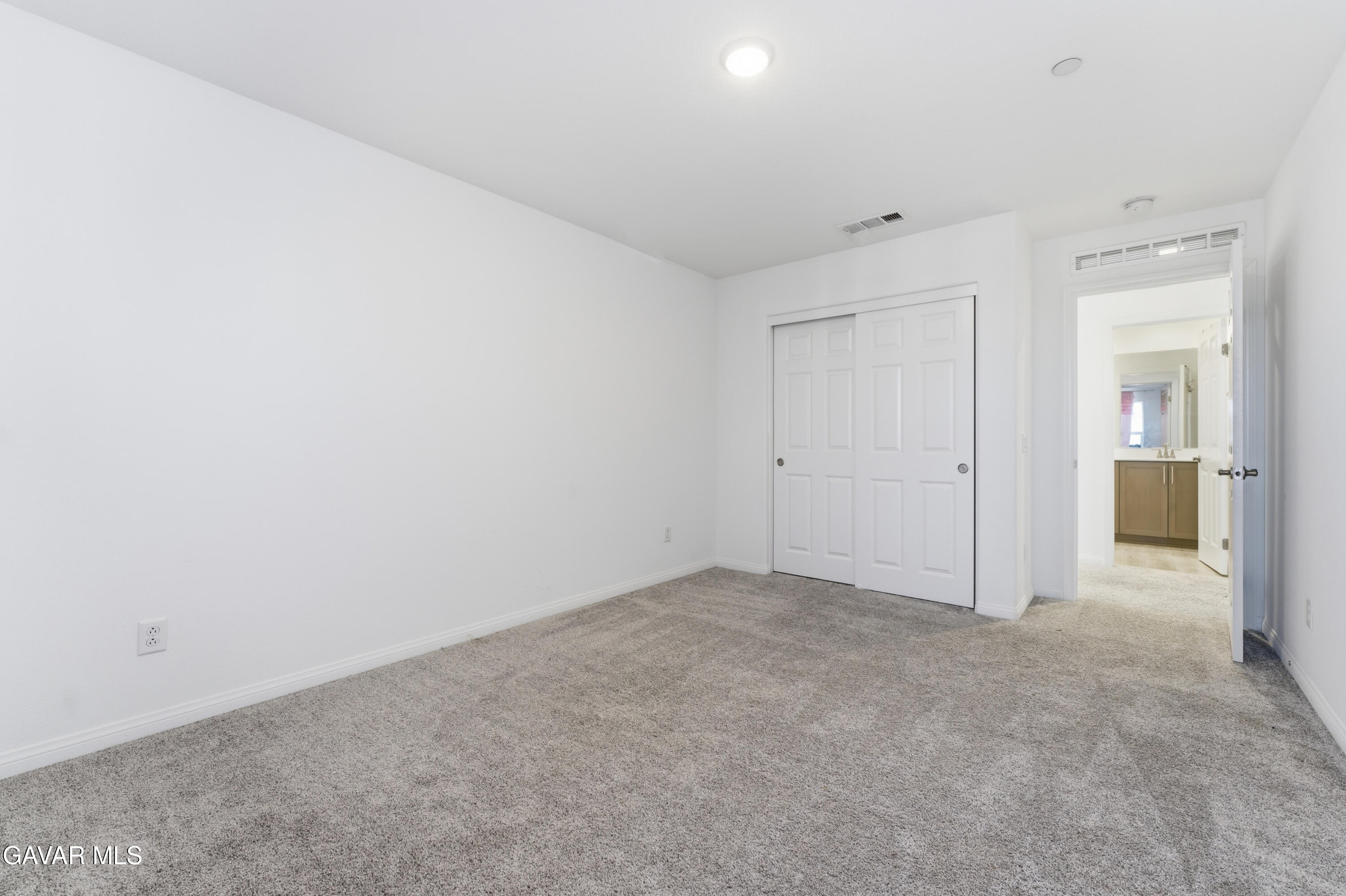 43869 Hampton Street Lancaster, CA 93536 - Photo 13 of 20 an empty room with an entryway
