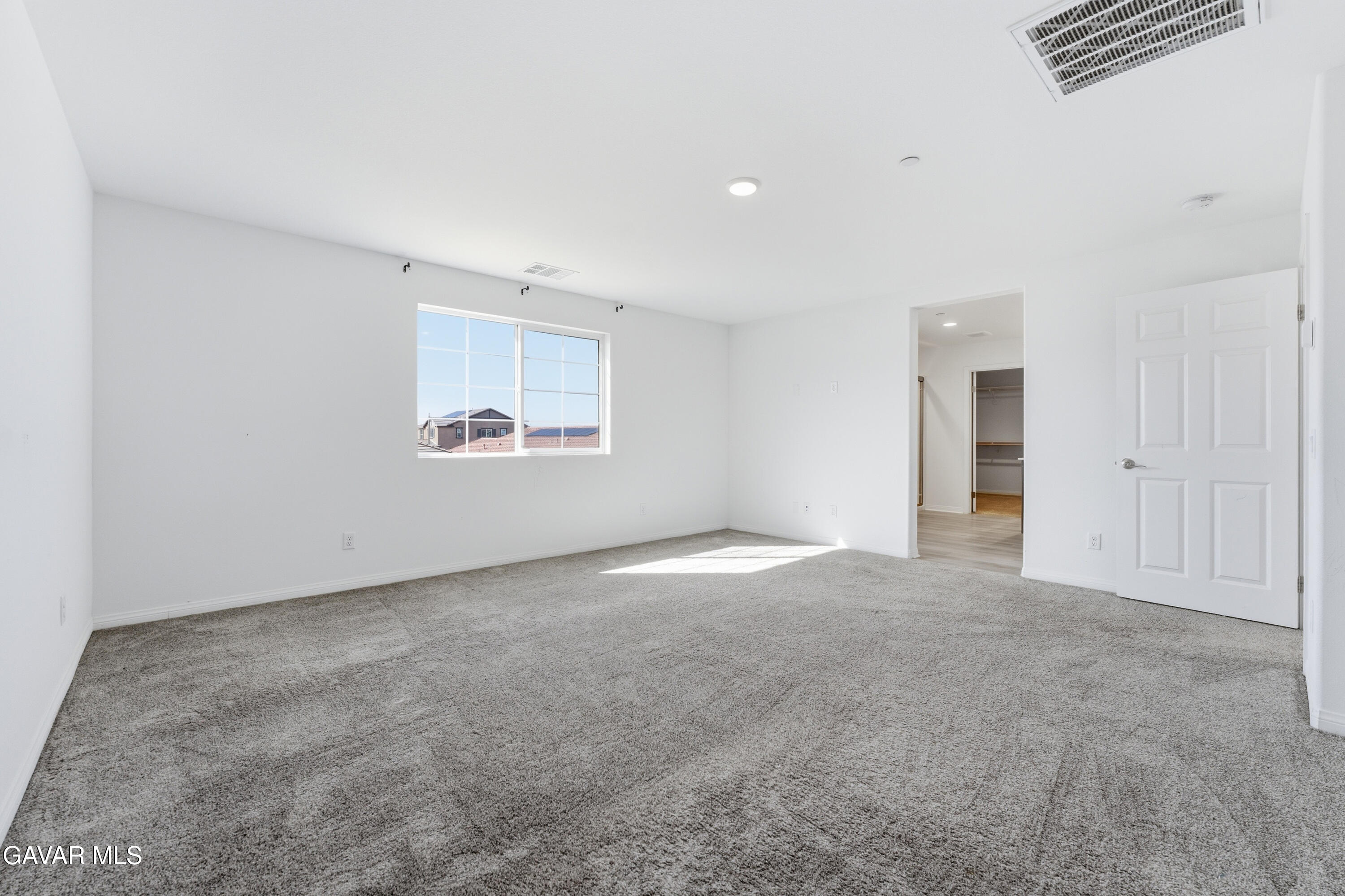 43869 Hampton Street Lancaster, CA 93536 - Photo 15 of 20 an empty room with windows and closet