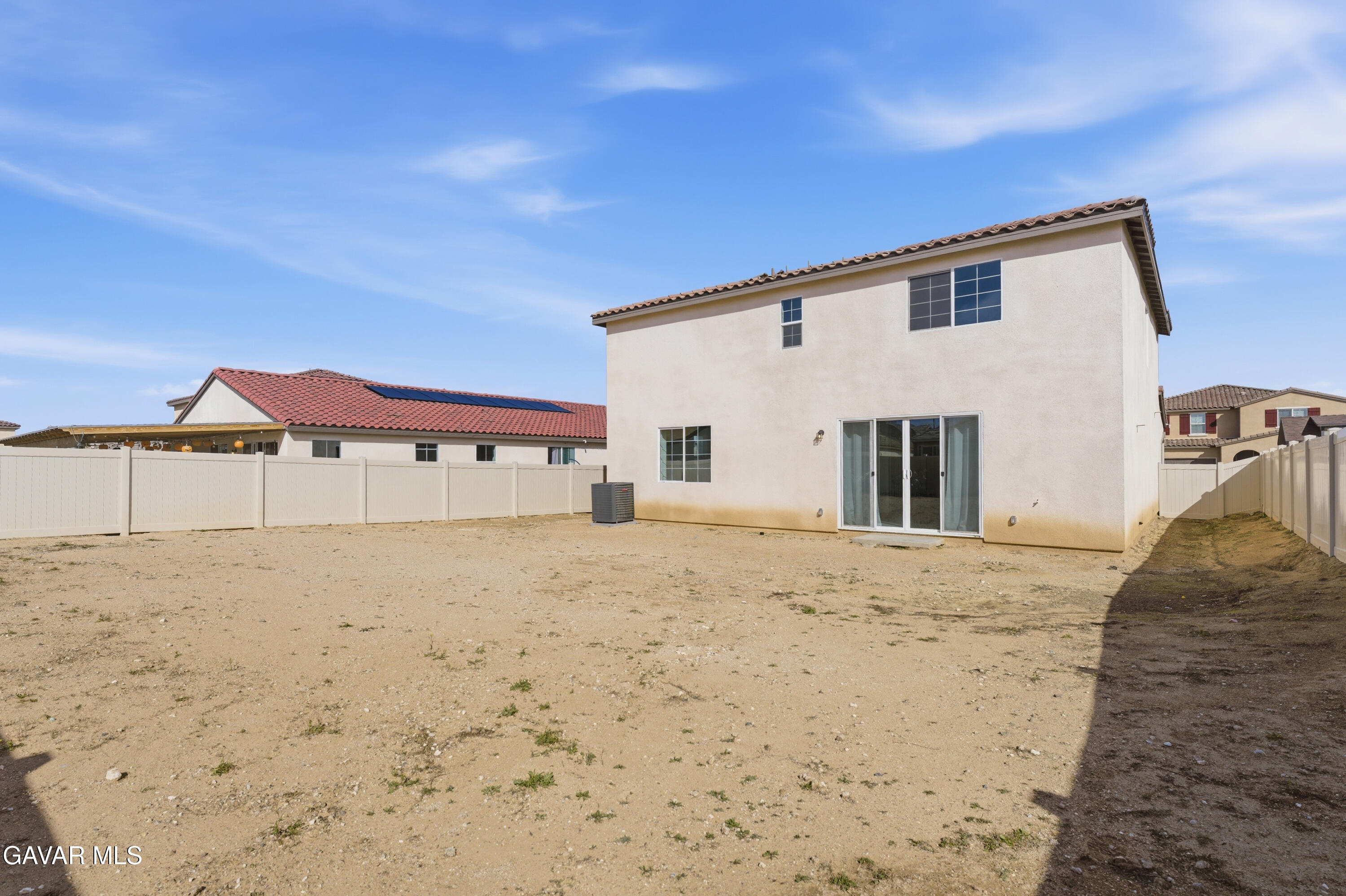 43869 Hampton Street Lancaster, CA 93536 - Photo 19 of 20 a front view of a house with a yard
