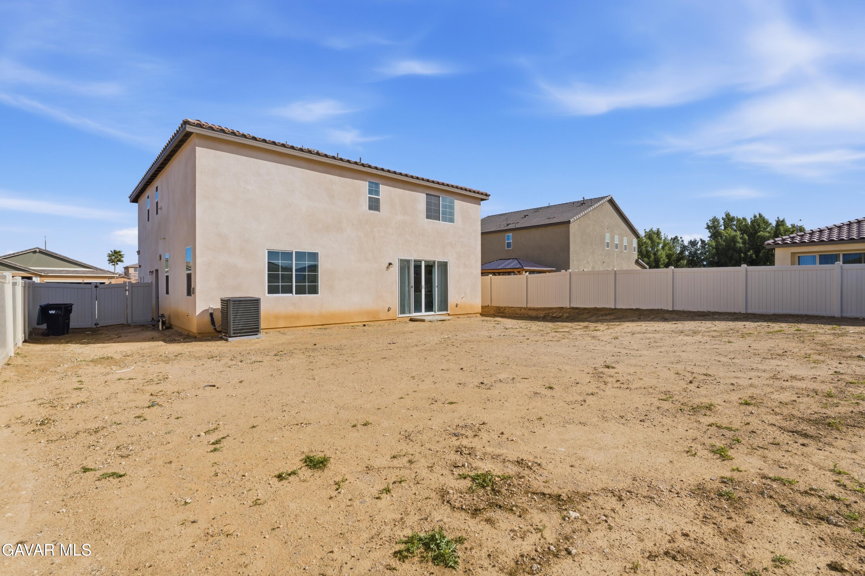 43869 Hampton Street Lancaster, CA 93536 - Photo 20 of 20 a view of large house with a yard