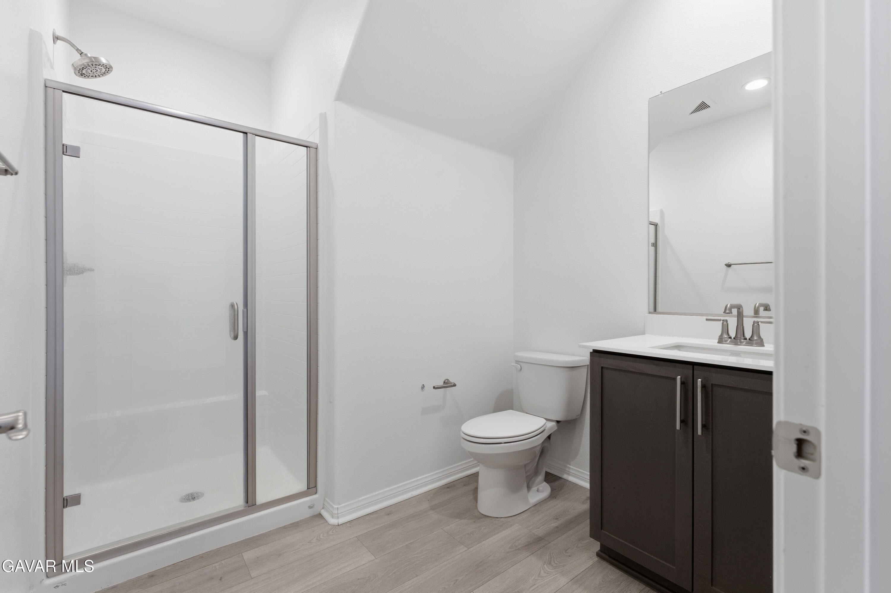 43869 Hampton Street Lancaster, CA 93536 - Photo 5 of 20 a bathroom with a sink toilet and shower