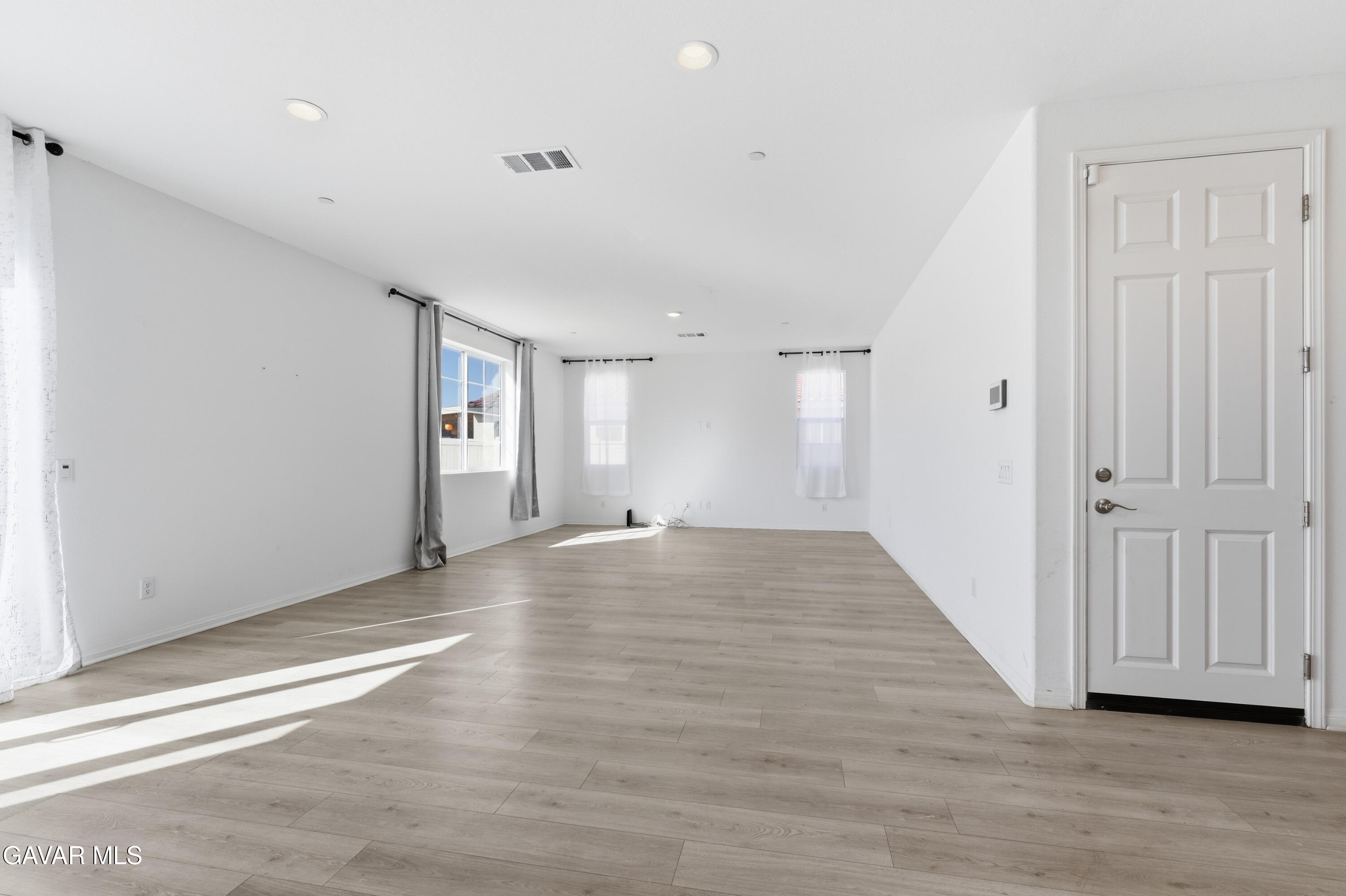 43869 Hampton Street Lancaster, CA 93536 - Photo 6 of 20 a view of a livingroom with wooden floor