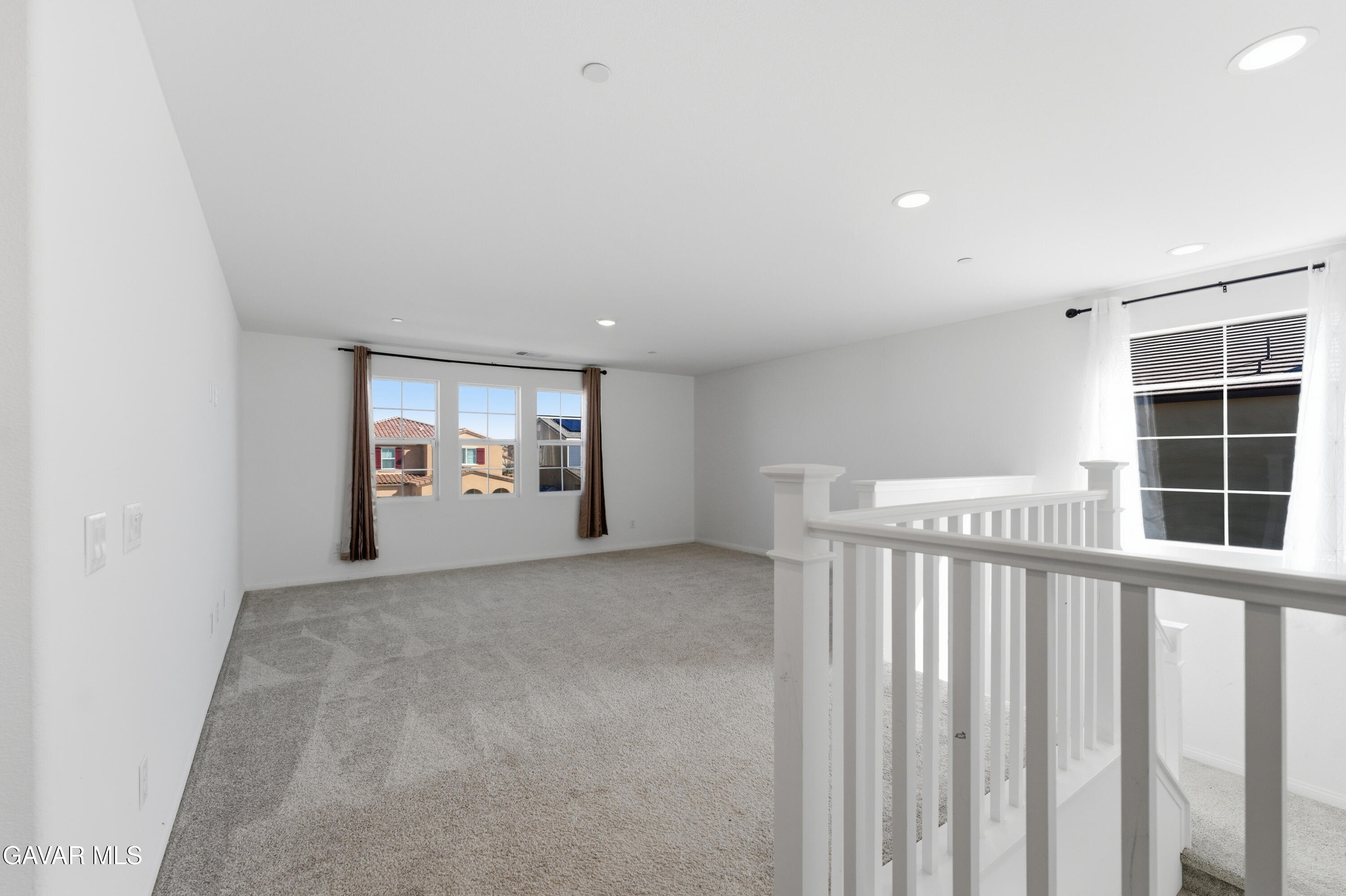 43869 Hampton Street Lancaster, CA 93536 - Photo 8 of 20 a view of an empty room with a window