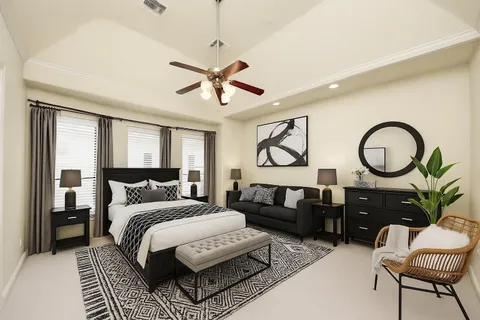 a bedroom with a bed furniture and a window