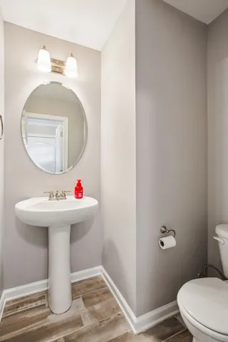 a bathroom with a sink and mirror