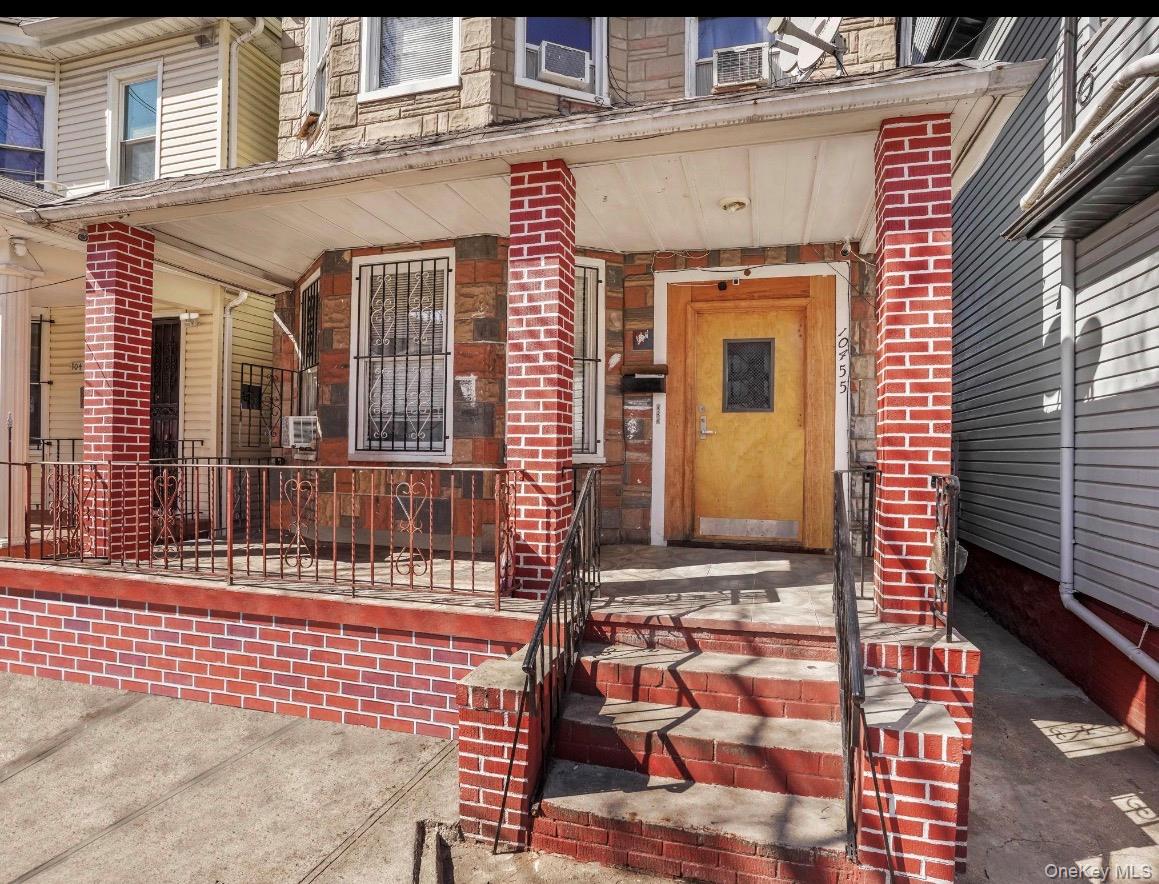 104-55 39th Avenue Queens, NY 11368 - Photo 1 of 14 a front view of a house