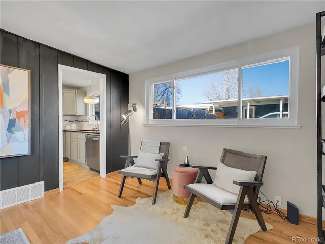 a workspace with furniture and window