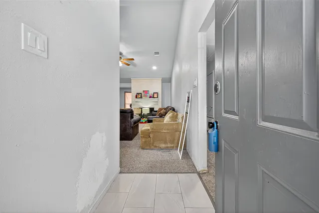 a view of utility room and living room