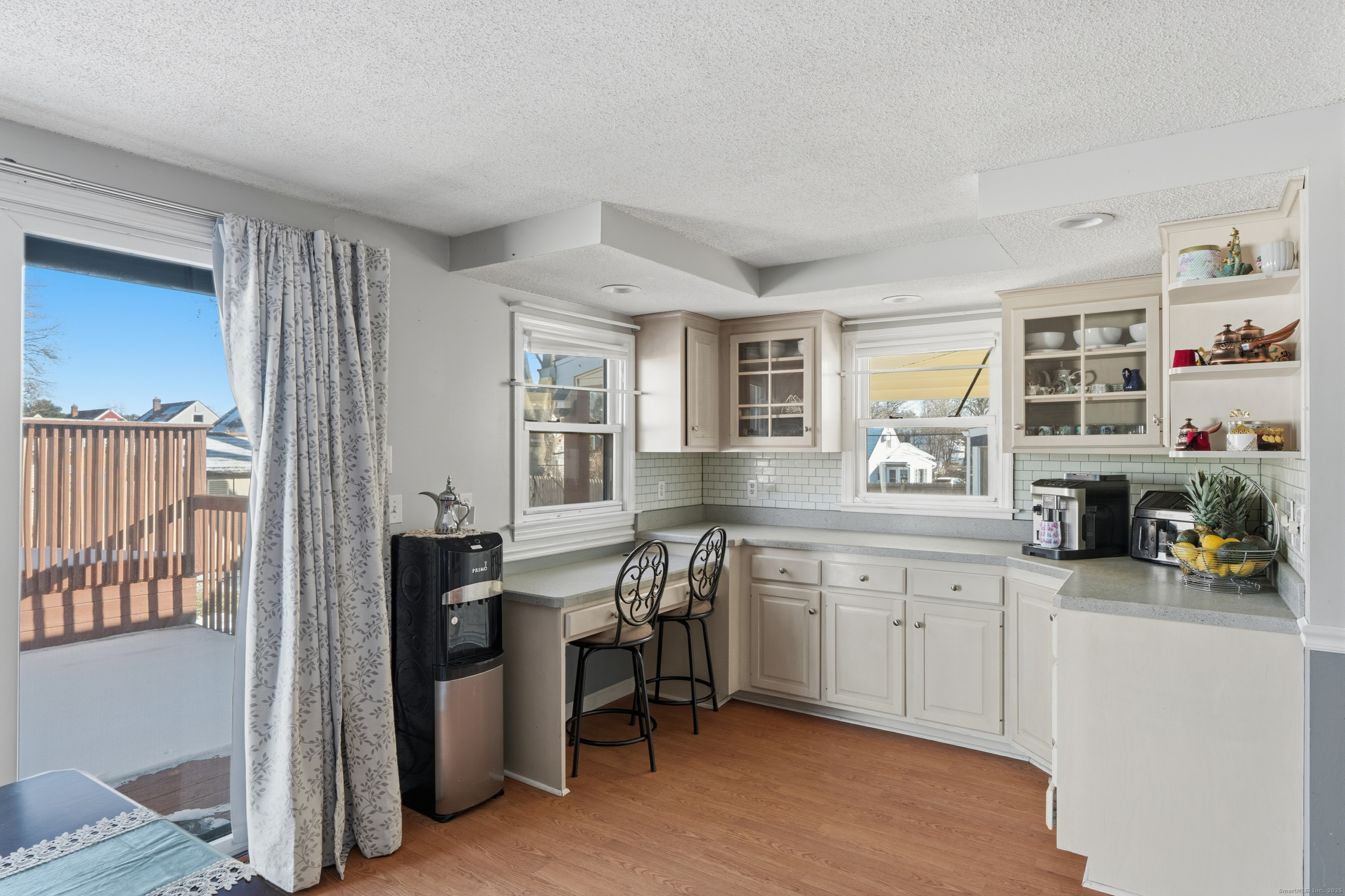 103 Benham Street Bristol, CT 06010 - Photo 16 of 39 a view of a kitchen and dining room