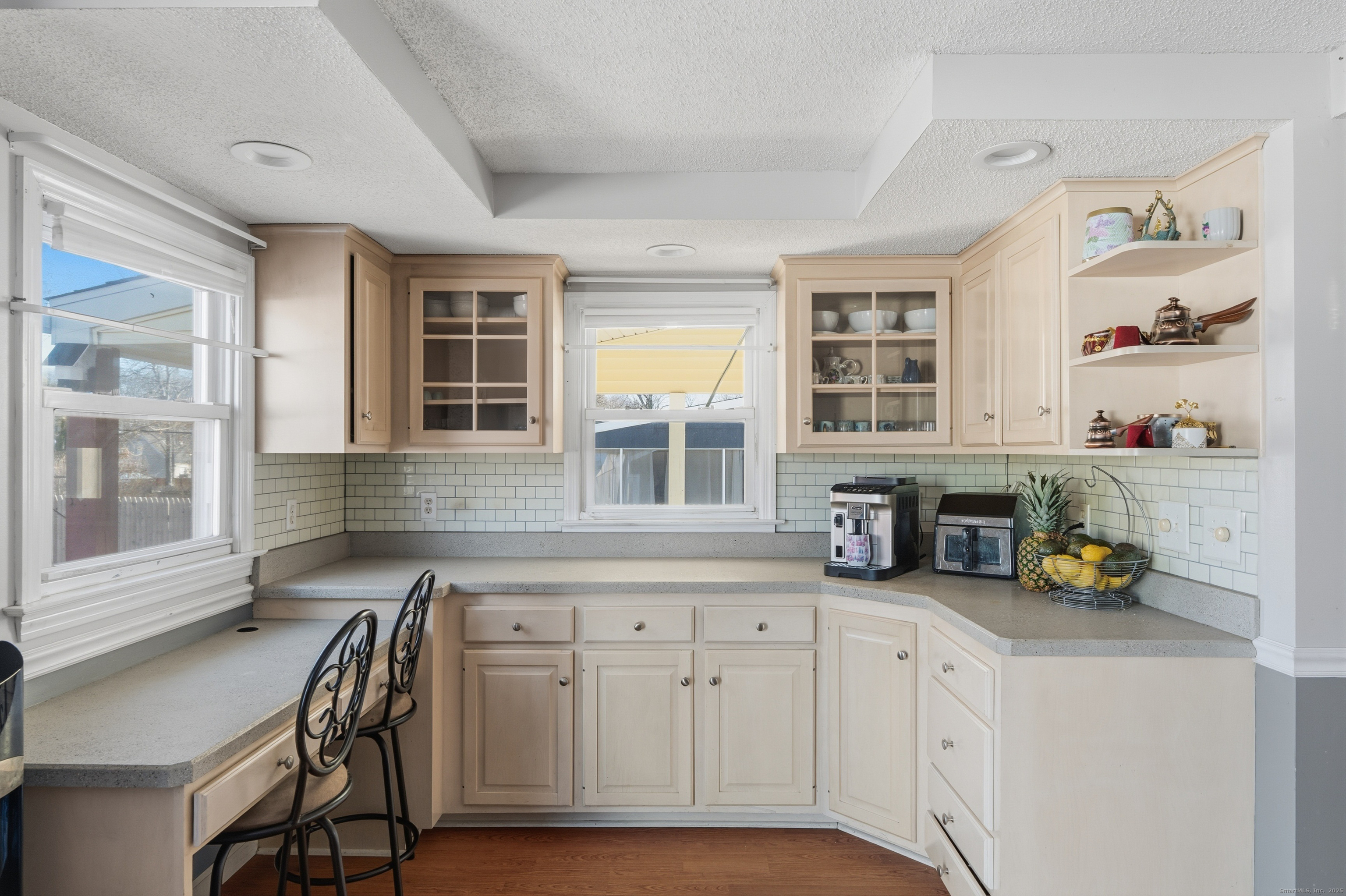 103 Benham Street Bristol, CT 06010 - Photo 17 of 39 a kitchen with a sink a table and chairs