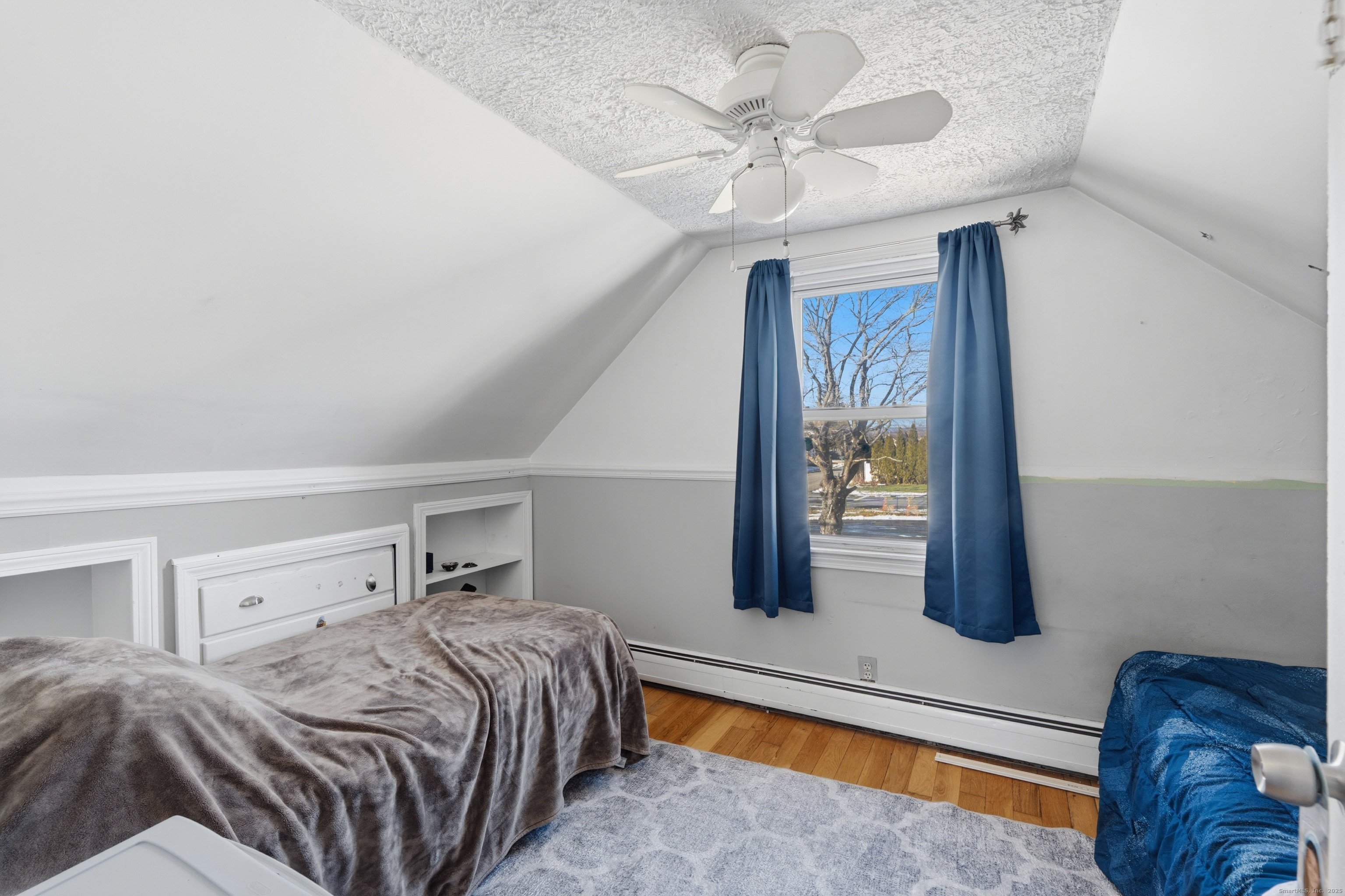 103 Benham Street Bristol, CT 06010 - Photo 23 of 39 a bedroom with a bed and a window