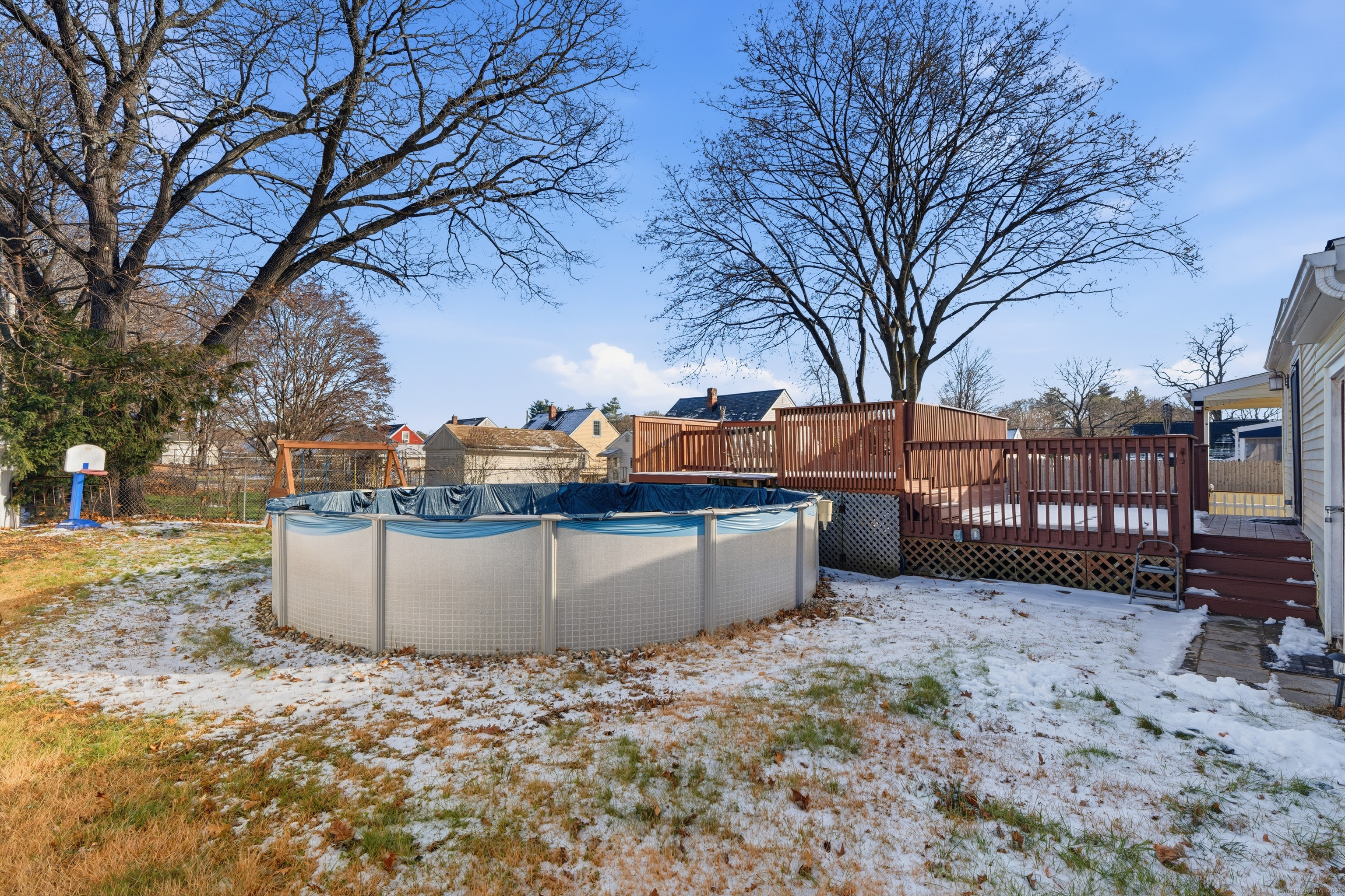 103 Benham Street Bristol, CT 06010 - Photo 35 of 39 a view of a covered with snow in the yard