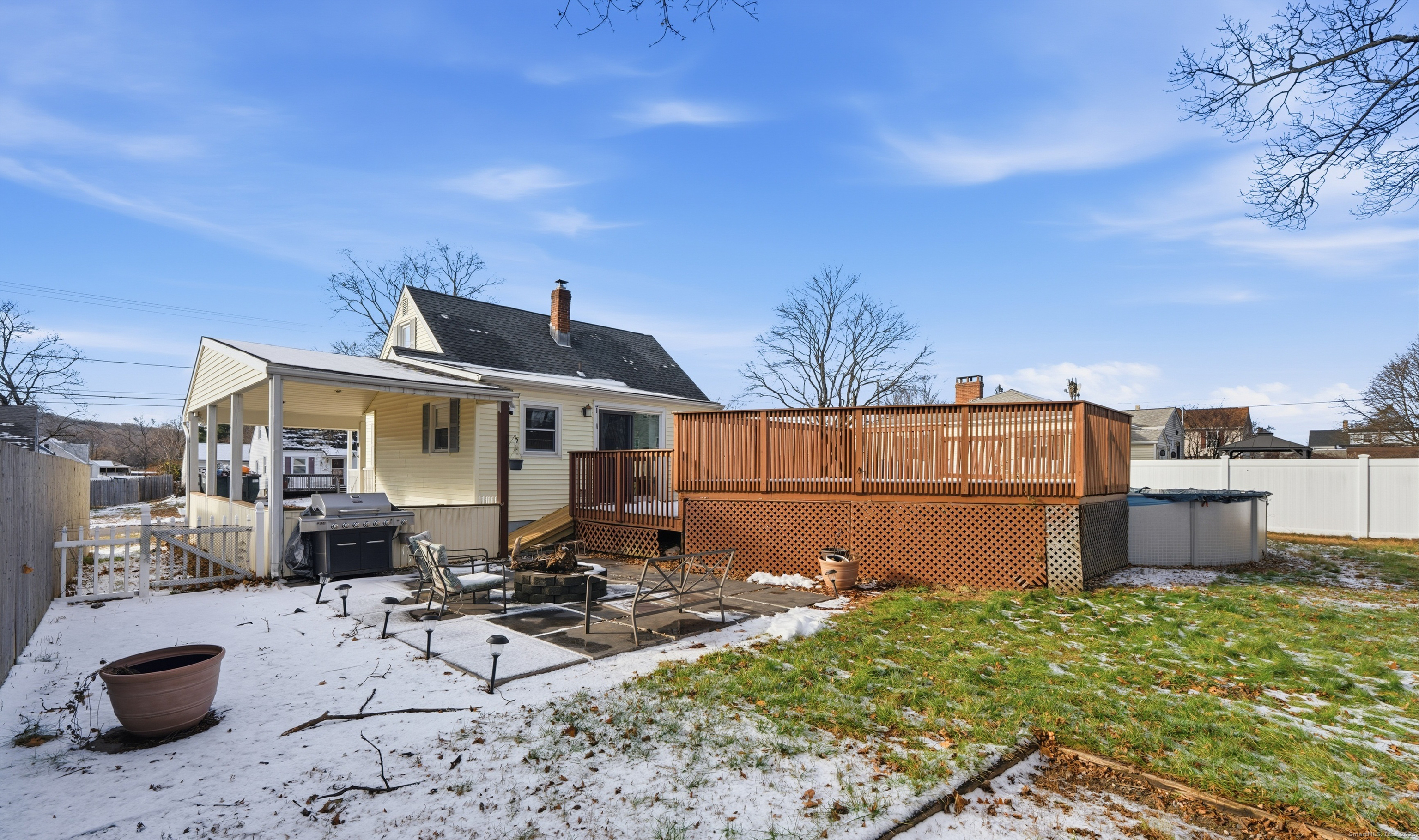103 Benham Street Bristol, CT 06010 - Photo 36 of 39 a front view of a house with yard and seating area