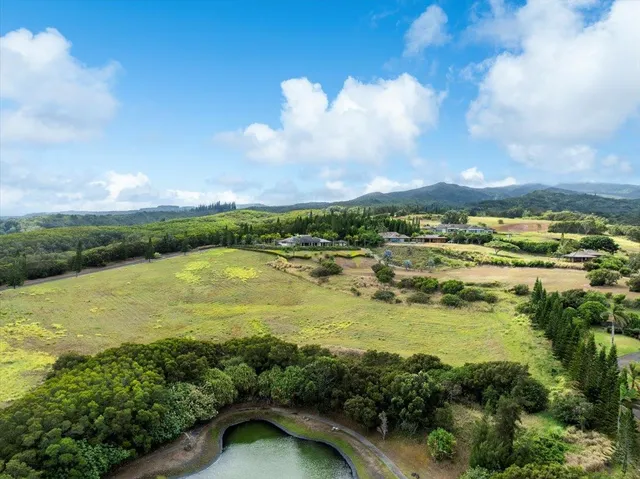 a view of an ocean and city