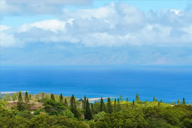 a sunset view with swimming pool