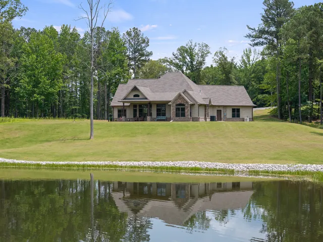 a view of a house with a ocean view