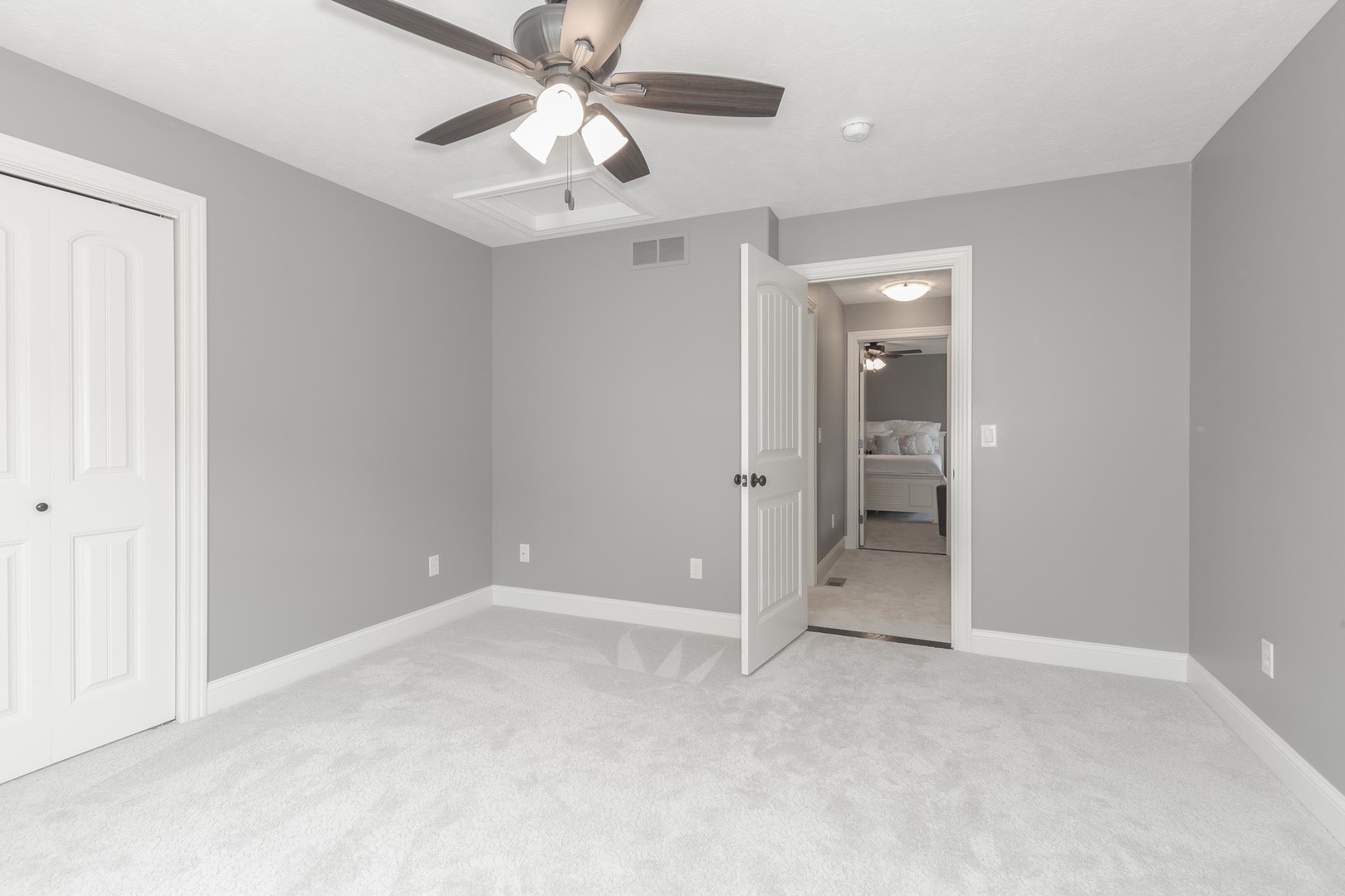 2610 Shepard Road Normal, IL 61761 - Photo 30 of 46 an empty room with fan and entrance