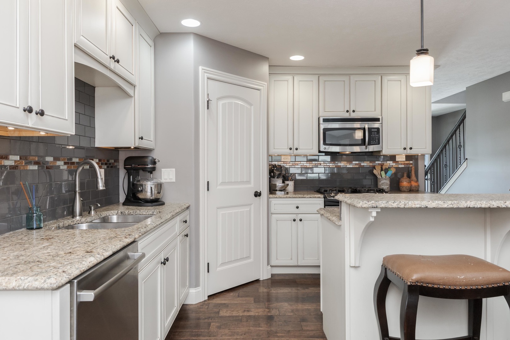 2610 Shepard Road Normal, IL 61761 - Photo 4 of 46 a kitchen with kitchen island granite countertop a sink stove and refrigerator